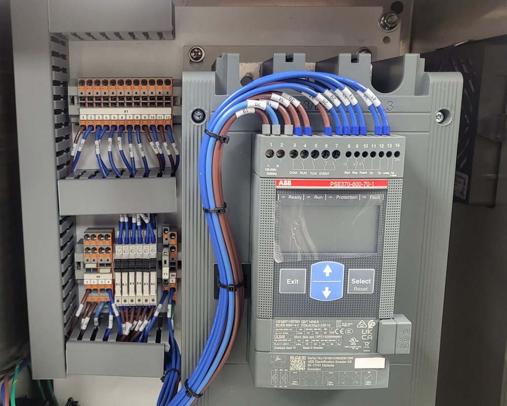 Marine control enclosure with soft starter, interior